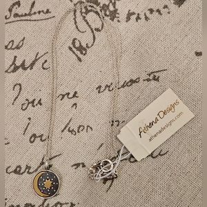 Sterling silver and brass crescent moon and star necklace